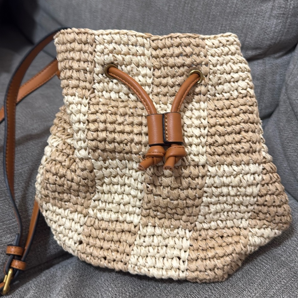Gently used Pink Lily woven checkered cross body bucket bag / purse
